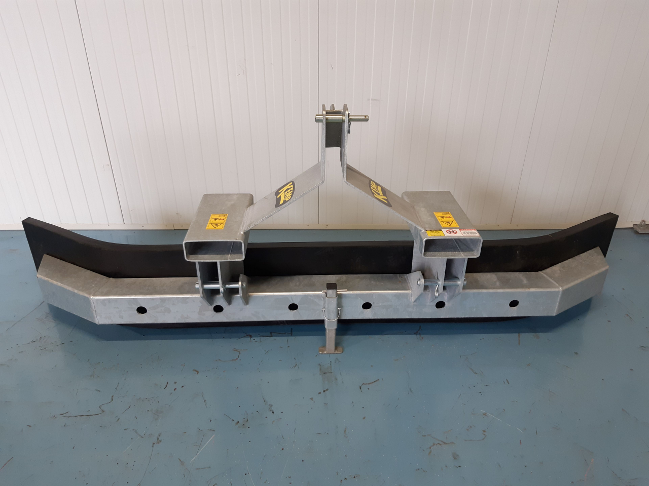Rubber scraper tractor or forklift Kemp Machines